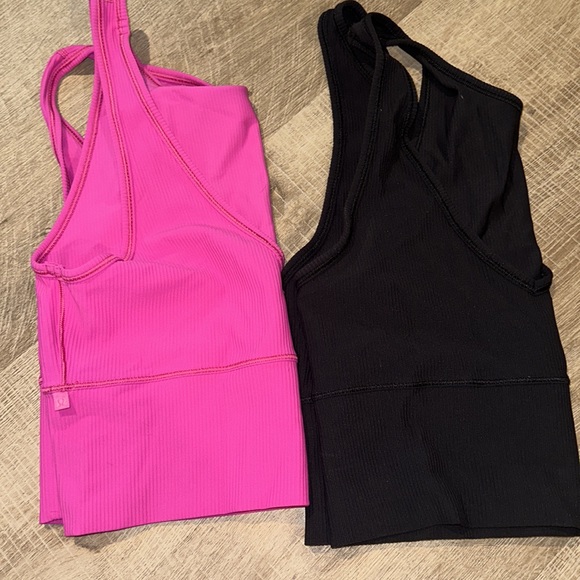 Two lulu lemon tanks, can wear either front or back. - Picture 2 of 2